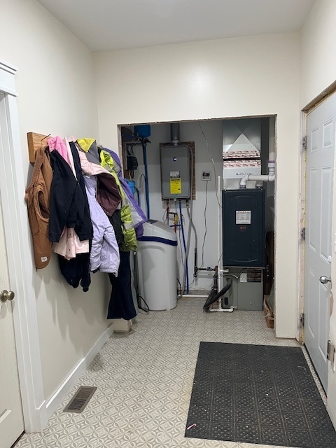 466 County Road 100 North Sadorus, IL 61872 - Photo 5 of 29 a view of a room with gym equipment