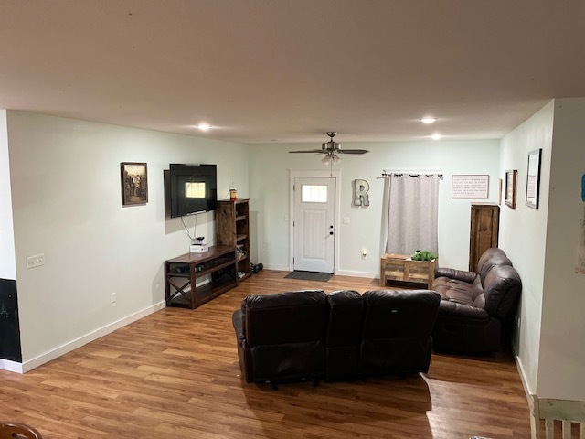 466 County Road 100 North Sadorus, IL 61872 - Photo 9 of 29 a bedroom with furniture and a flat screen tv