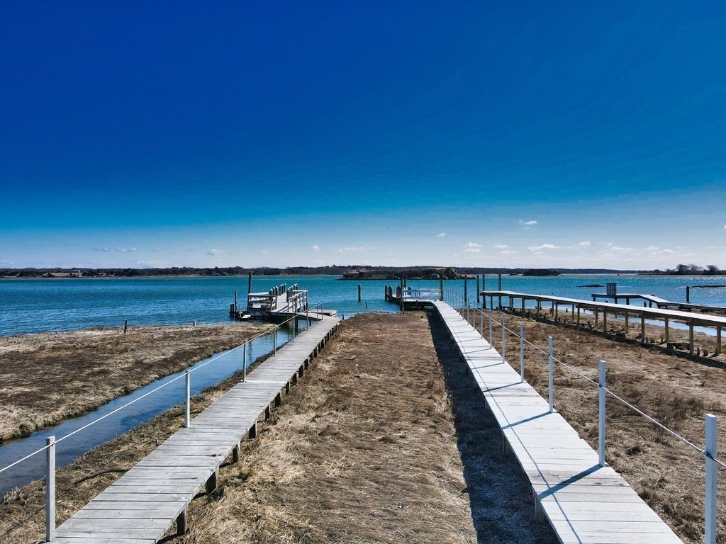 3 East Shore Road Westport, MA 02791 - Photo 4 of 21 a view of a swimming pool and an ocean
