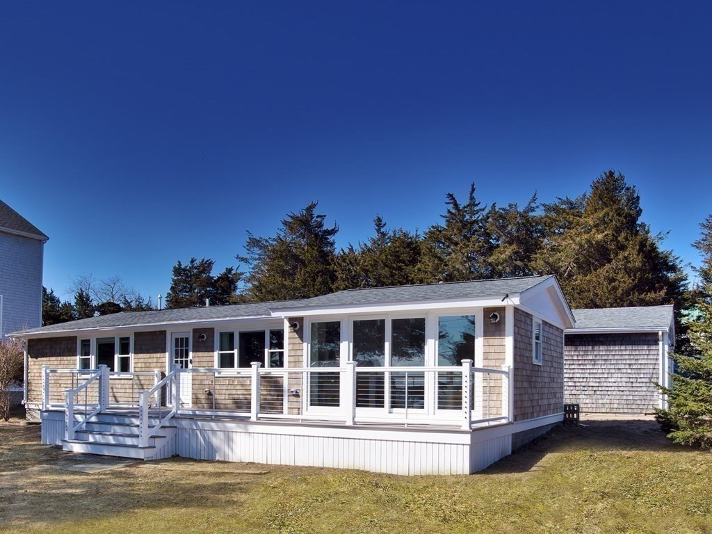 3 East Shore Road Westport, MA 02791 - Photo 5 of 21 a view of a house with swimming pool in front of it