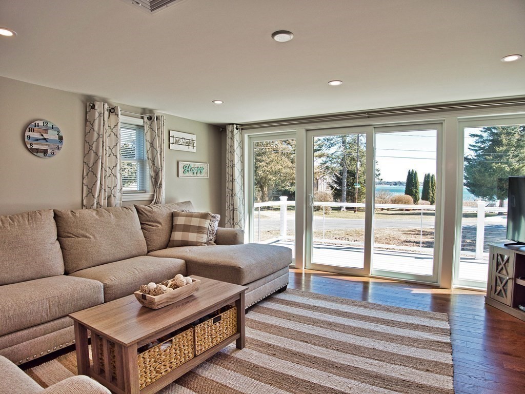 3 East Shore Road Westport, MA 02791 - Photo 9 of 21 a living room with furniture and a large window