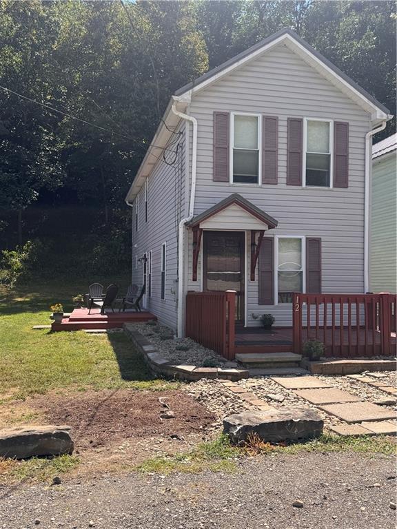 12 Young Lane Charleroi, PA 15022 - Photo 1 of 24 a front view of a house with a yard