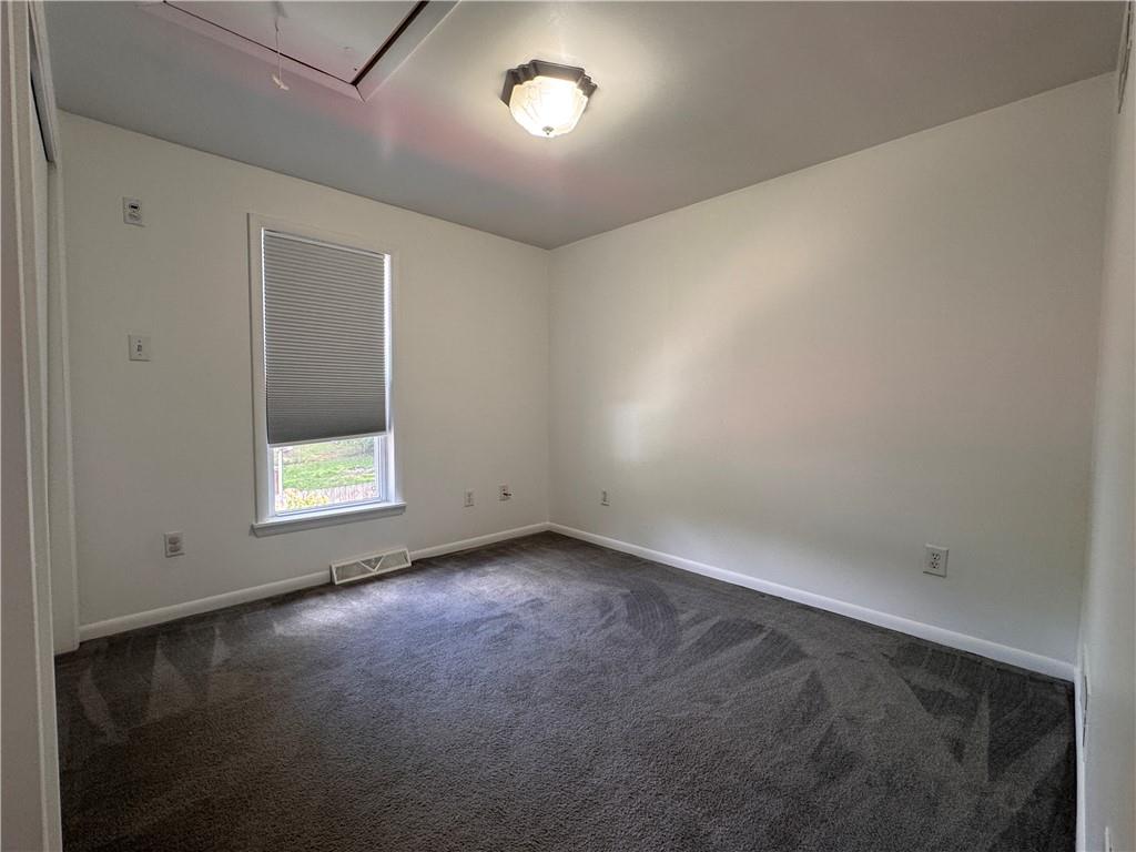 12 Young Lane Charleroi, PA 15022 - Photo 15 of 24 an empty room with a window