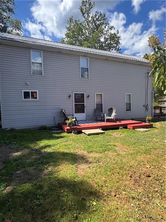 12 Young Lane Charleroi, PA 15022 - Photo 22 of 24 a backyard of a house with barbeque oven table and chairs