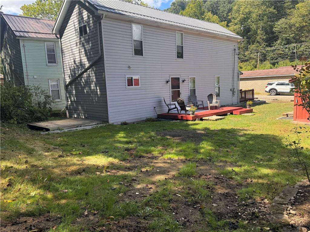12 Young Lane Charleroi, PA 15022 - Photo 23 of 24 a view of a house with backyard and sitting area