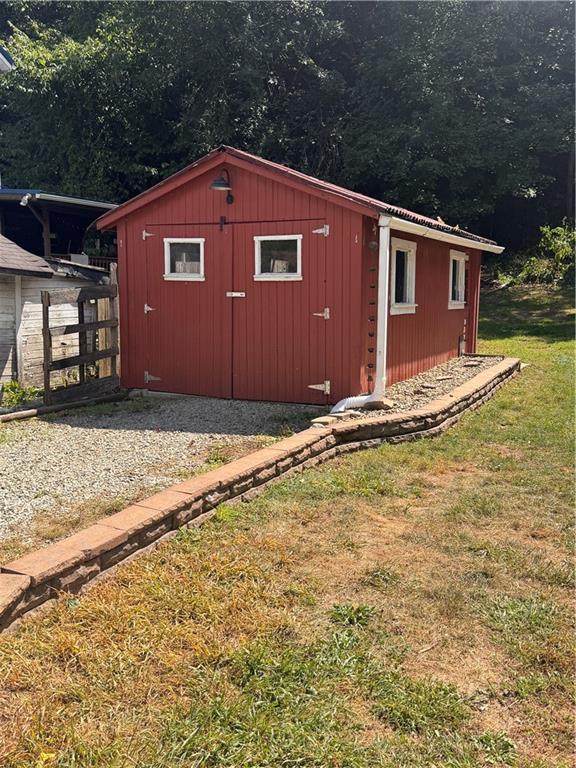 12 Young Lane Charleroi, PA 15022 - Photo 24 of 24 a front view of a house with a yard