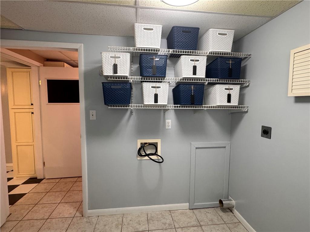 12 Young Lane Charleroi, PA 15022 - Photo 9 of 24 a view of a kitchen with stainless steel appliances wooden floor and a window