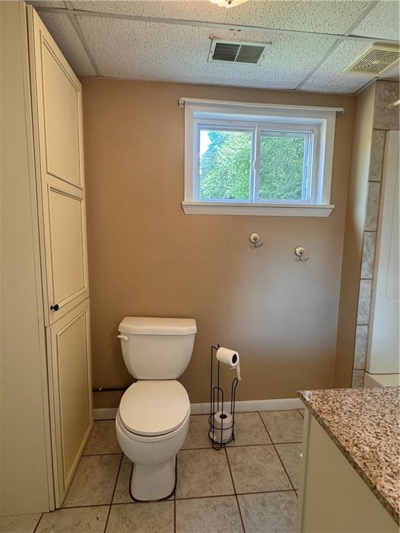 12 Young Lane Charleroi, PA 15022 - Photo 10 of 24 a bathroom with a granite countertop toilet and a sink