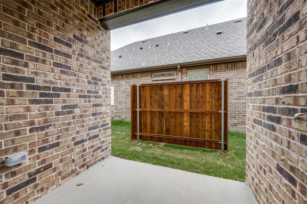 1237 Milfoil Drive Justin, TX 76247 - Photo 24 of 27 Easy to maintain yard. Just enough to play in