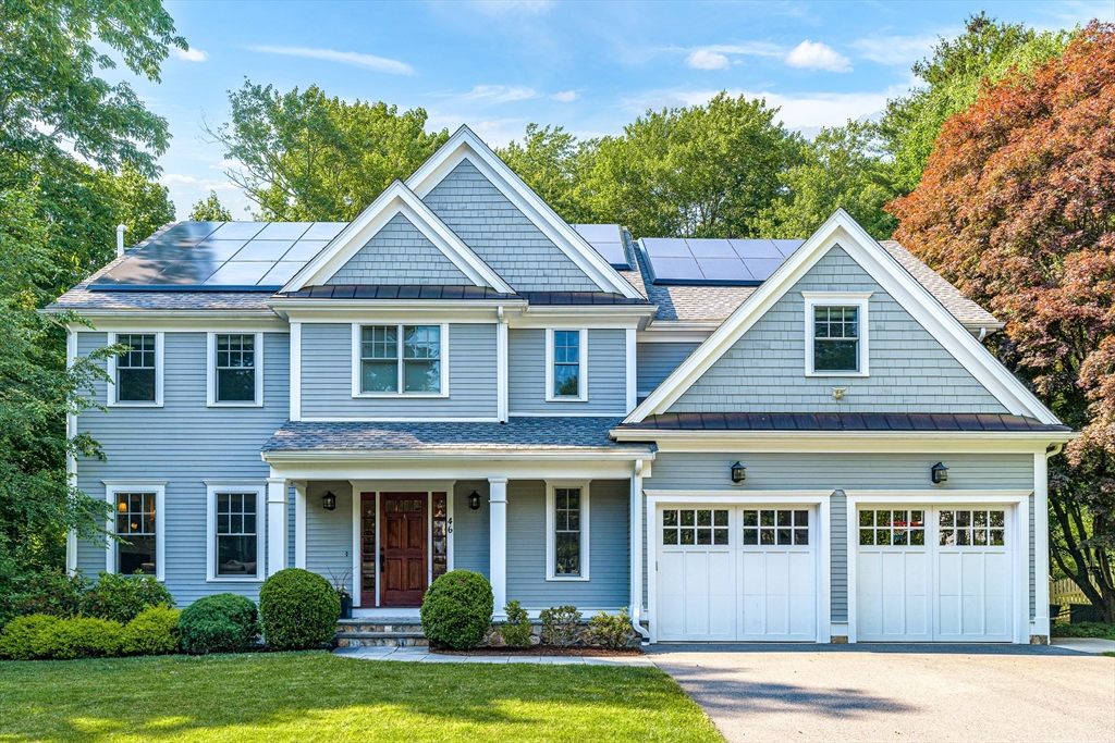 46 Pilgrim Road Wellesley, MA 02481 - Photo 1 of 35 a front view of a house with a yard