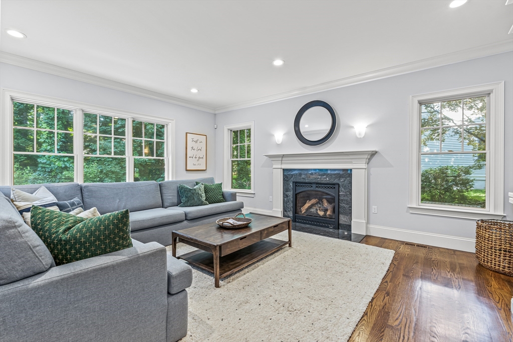 46 Pilgrim Road Wellesley, MA 02481 - Photo 11 of 35 a living room with furniture and a fireplace