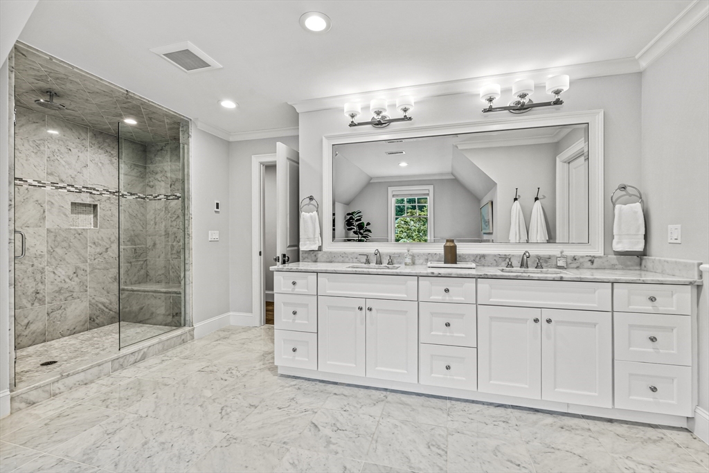 46 Pilgrim Road Wellesley, MA 02481 - Photo 14 of 35 a spacious bathroom with a granite countertop sink a toilet a mirror and shower