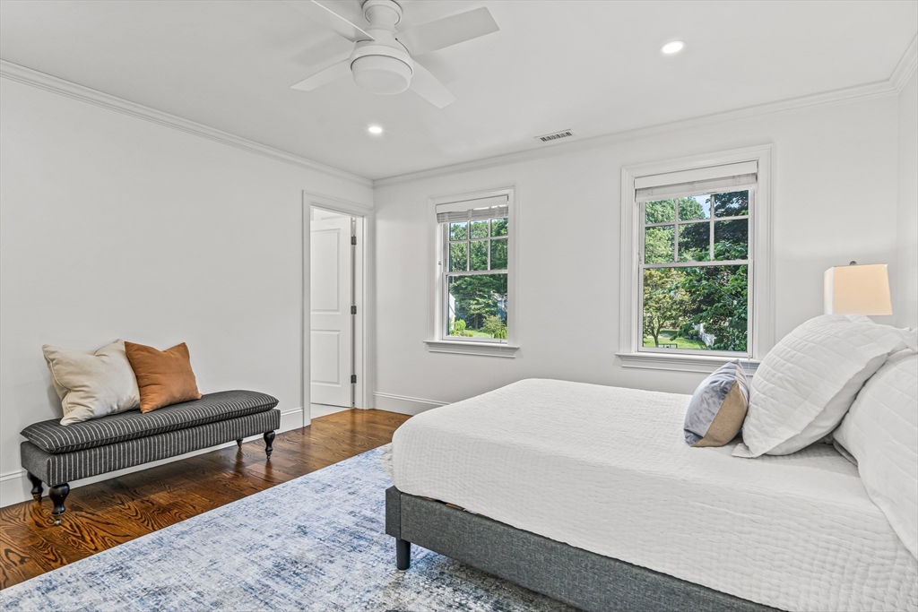 46 Pilgrim Road Wellesley, MA 02481 - Photo 17 of 35 a spacious bedroom with a bed and a couch