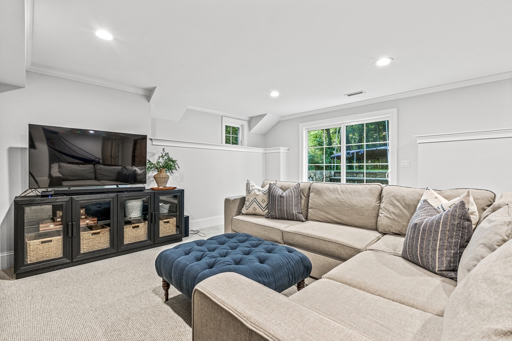 46 Pilgrim Road Wellesley, MA 02481 - Photo 26 of 35 a living room with furniture and a flat screen tv