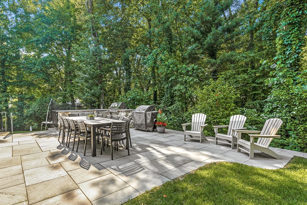 46 Pilgrim Road Wellesley, MA 02481 - Photo 32 of 35 a view of a sitting area with furniture and garden