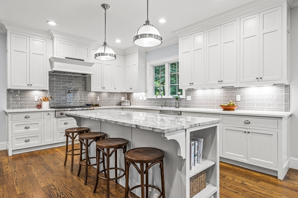 46 Pilgrim Road Wellesley, MA 02481 - Photo 6 of 35 a kitchen with stainless steel appliances granite countertop white cabinets a sink and dishwasher
