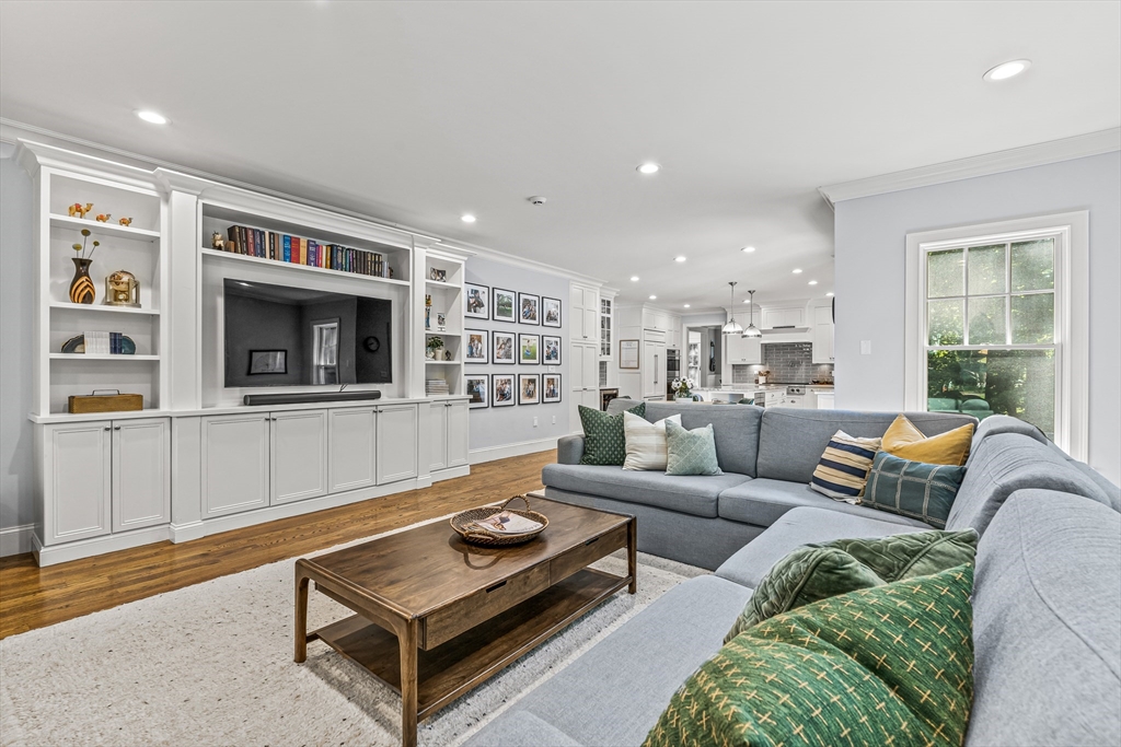 46 Pilgrim Road Wellesley, MA 02481 - Photo 10 of 35 a living room with furniture and a flat screen tv