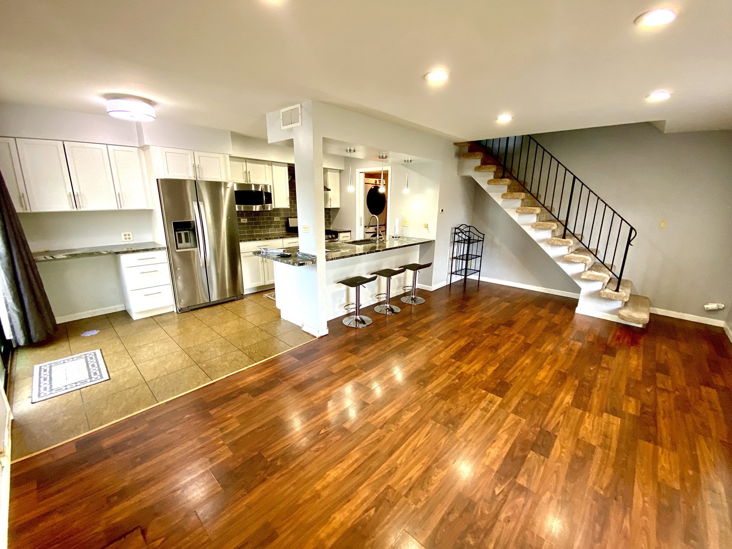 1534 Cornell Circle, Unit 34D Hoffman Estates, IL 60169 - Photo 2 of 15 a lobby with furniture and wooden floor