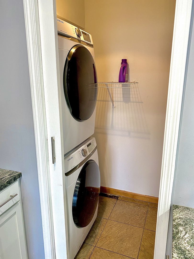 1534 Cornell Circle, Unit 34D Hoffman Estates, IL 60169 - Photo 6 of 15 a utility room with dryer and washer