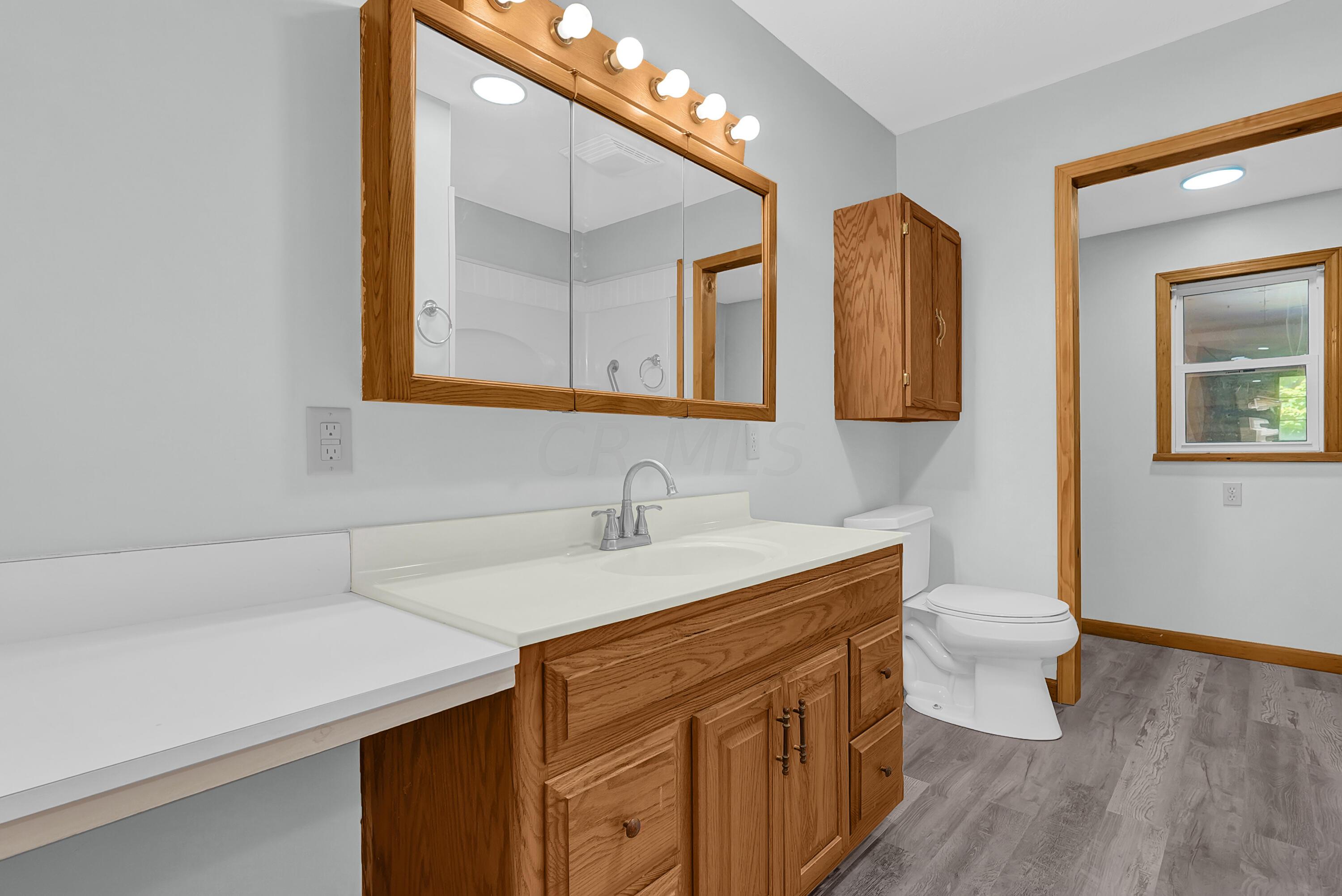 6865 Revenge Road Southwest Lancaster, OH 43130 - Photo 16 of 35 Vanity space in bathroom