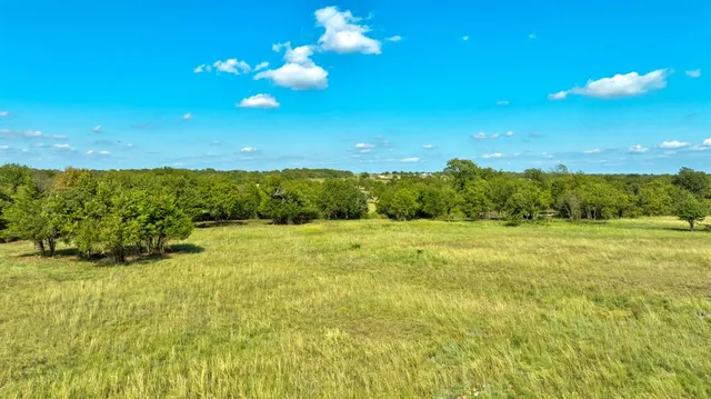 a view of an outdoor space and a yard