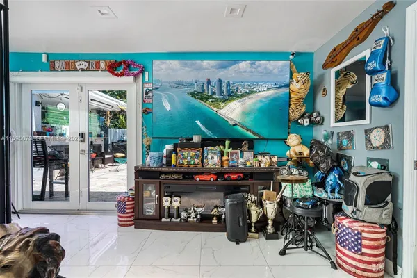 a view of a storage and utility room with washer and dryer