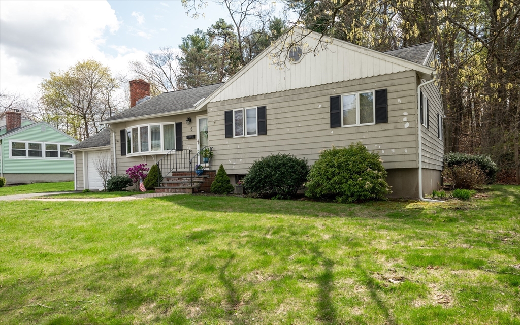 6 Janice Lane Stoneham, MA 02180 - Photo 2 of 35 a front view of house with yard and trees around
