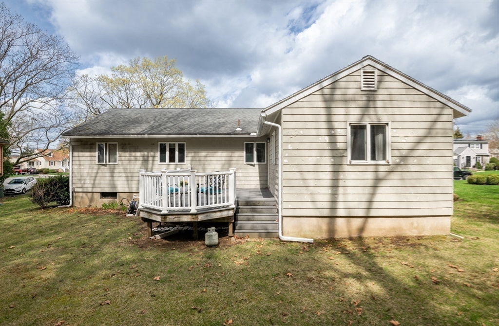 6 Janice Lane Stoneham, MA 02180 - Photo 30 of 35 a front view of a house with a yard