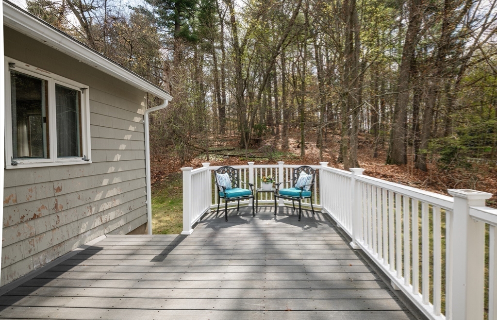 6 Janice Lane Stoneham, MA 02180 - Photo 32 of 35 a view of a chairs and table on the wooden floor