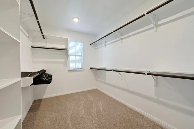 a view of a walk in closet