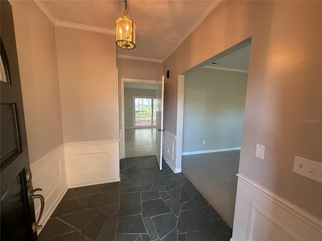 a bathroom with a shower a toilet and sink