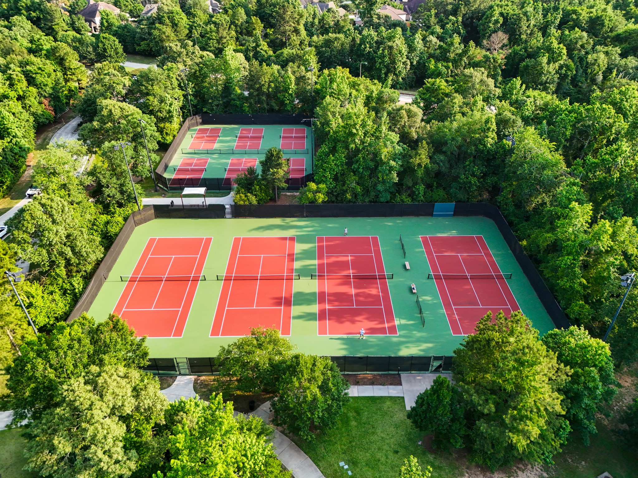 334 Topper Pines Drive Montgomery, TX 77316 - Photo 44 of 49 Woodforest’s sports courts add another layer to the community lifestyle, with tennis and pickleball tucked among the trees for residents who want recreation close to home.