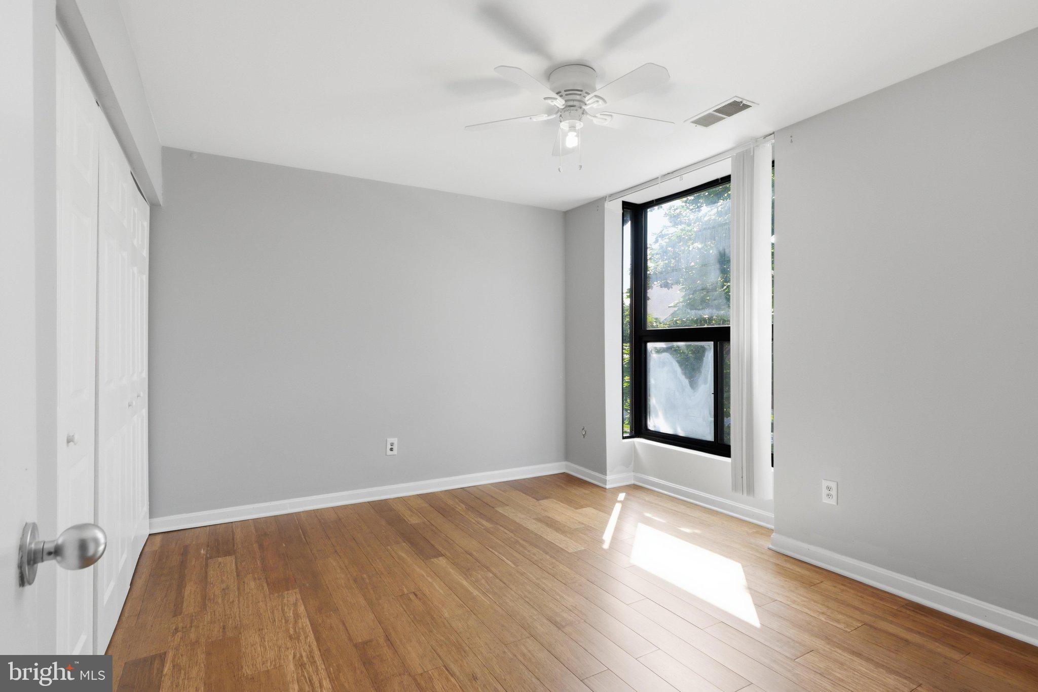 5538 Vantage Point Road Columbia, MD 21044 - Photo 25 of 50 wooden floor in an empty room with a window