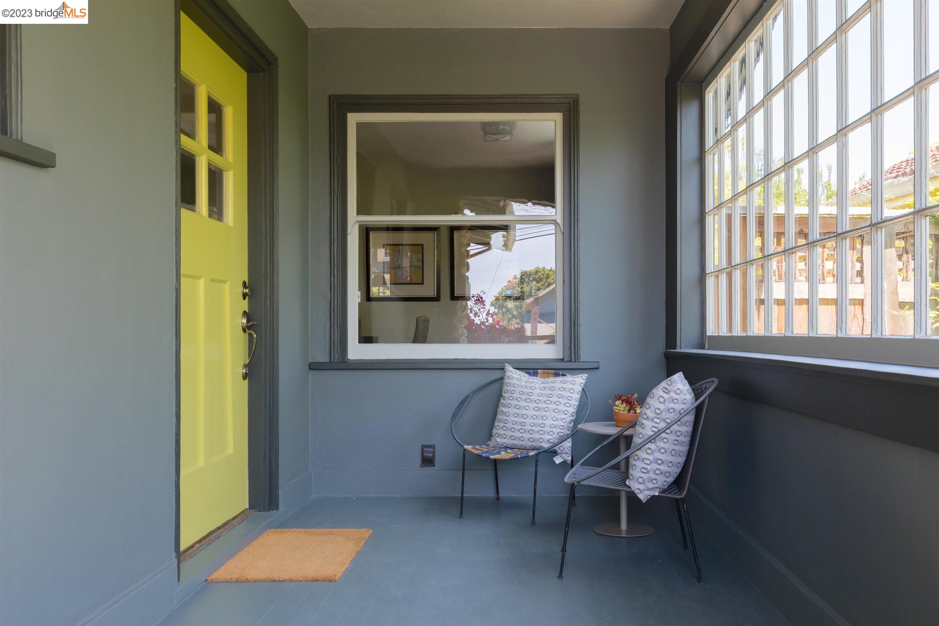 911 Tulare Avenue Berkeley, CA 94707 - Photo 2 of 21 a living room with furniture and a window