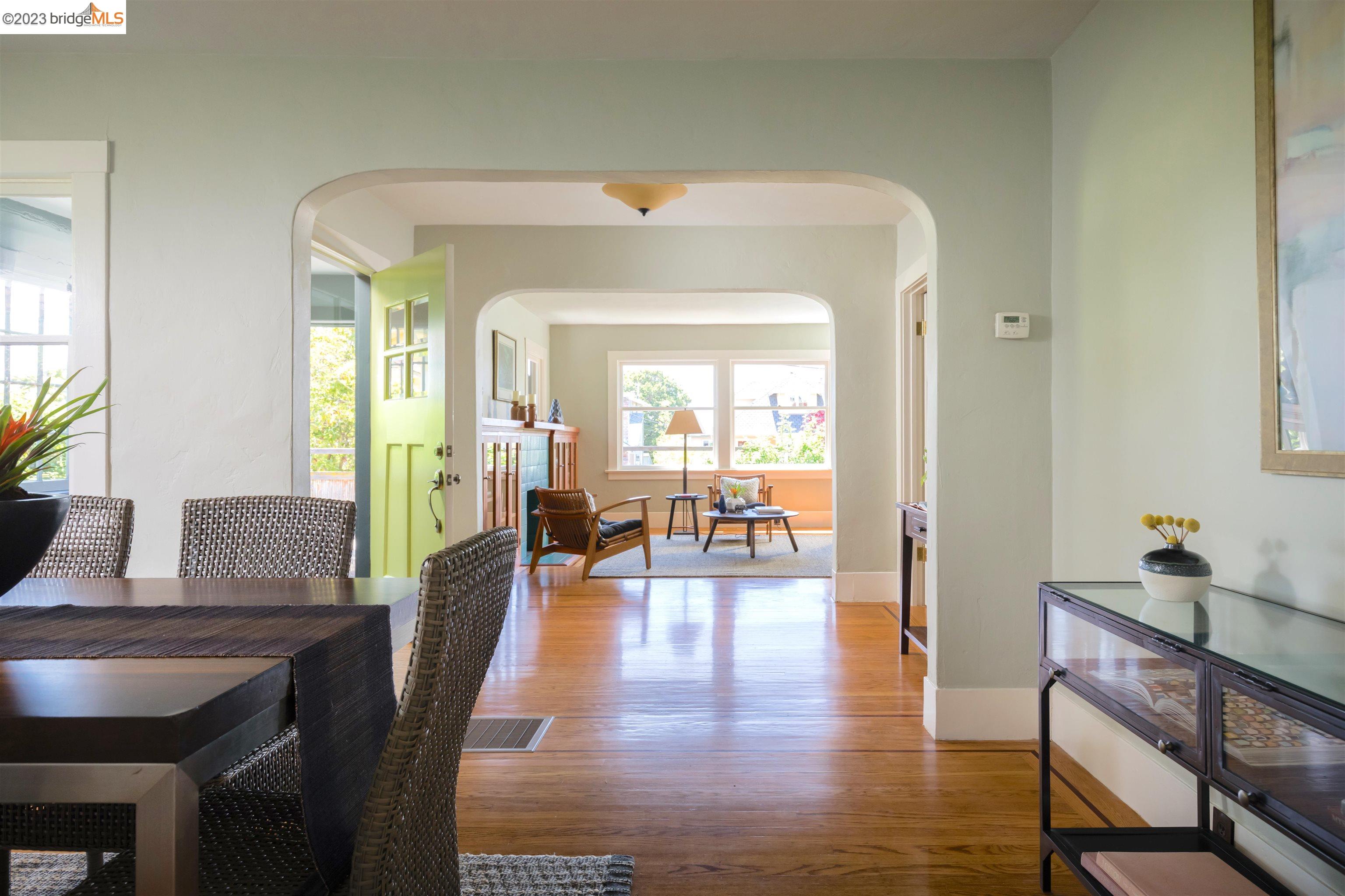 911 Tulare Avenue Berkeley, CA 94707 - Photo 7 of 21 a living room with furniture and a wooden floor