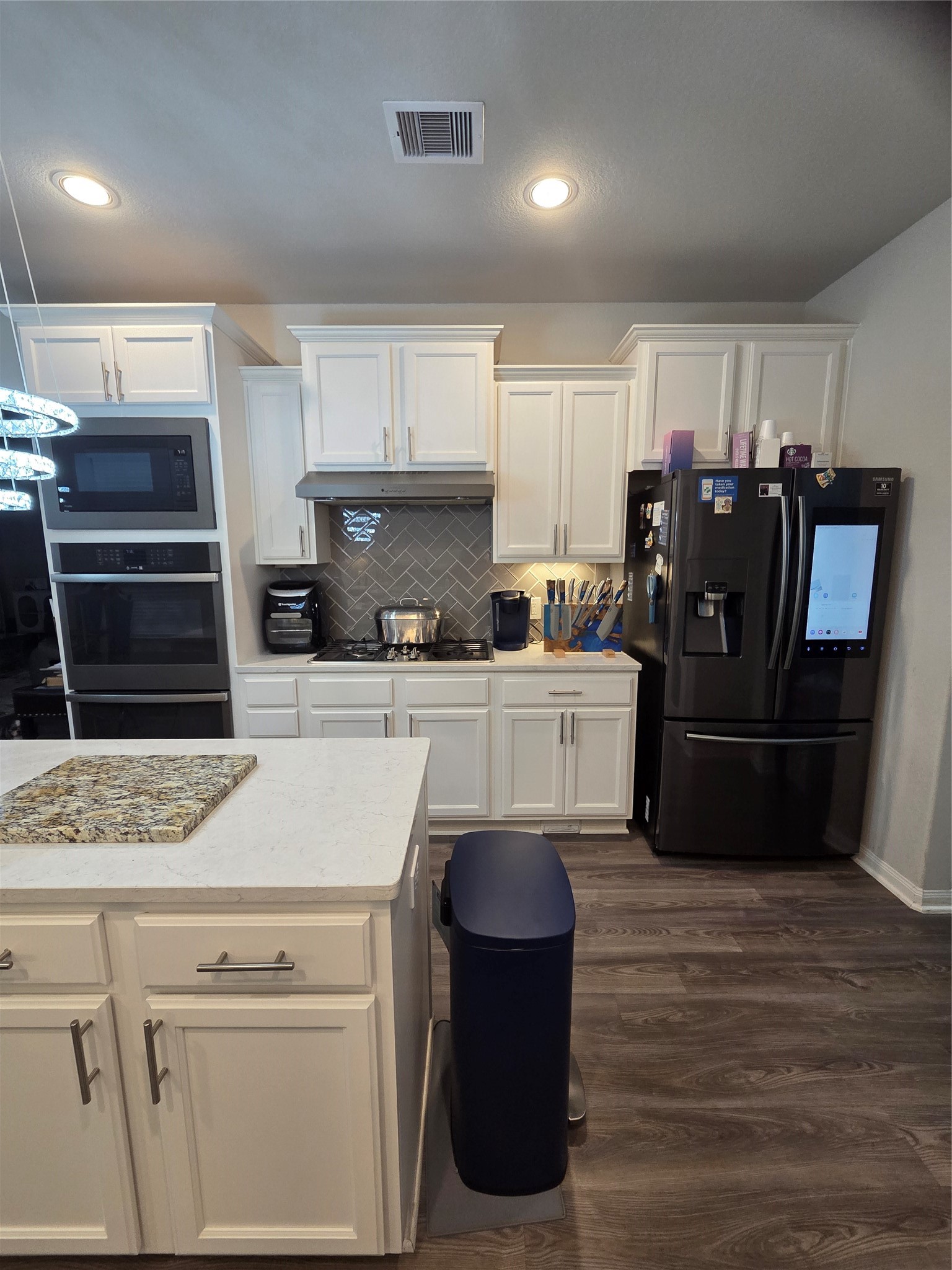 2375 Diamond D Lane Beaumont, TX 77713 - Photo 15 of 43 a kitchen with a sink cabinets and stainless steel appliances