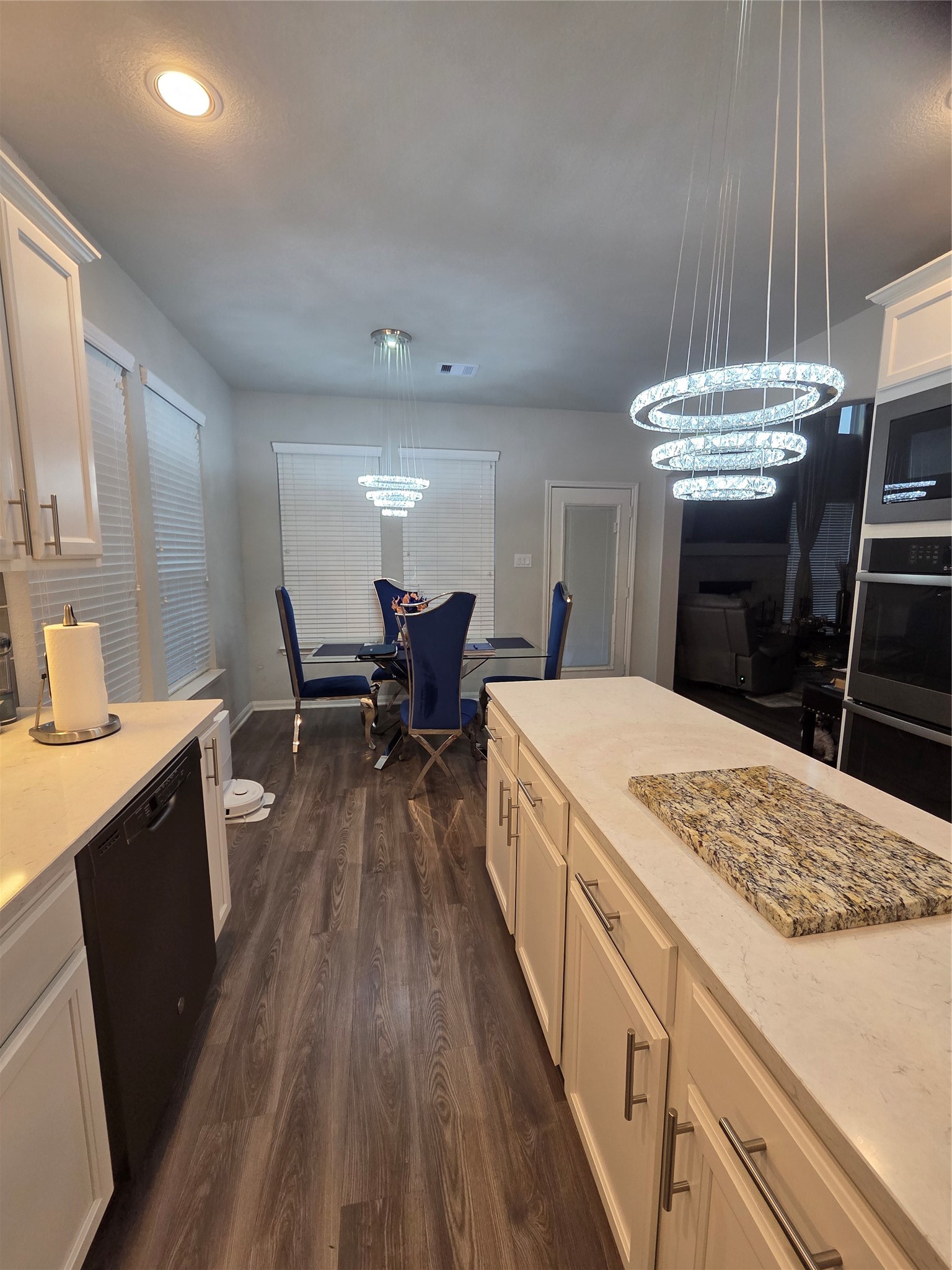 2375 Diamond D Lane Beaumont, TX 77713 - Photo 16 of 43 a kitchen with sink cabinets and wooden floor