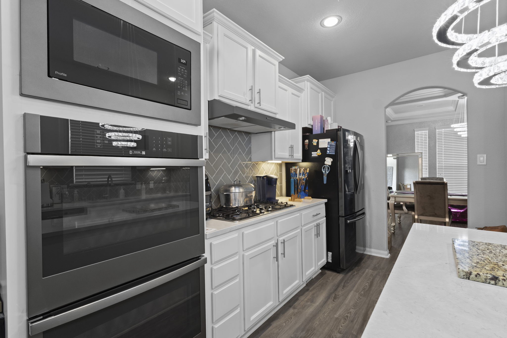 2375 Diamond D Lane Beaumont, TX 77713 - Photo 19 of 43 a kitchen with a refrigerator stove and microwave