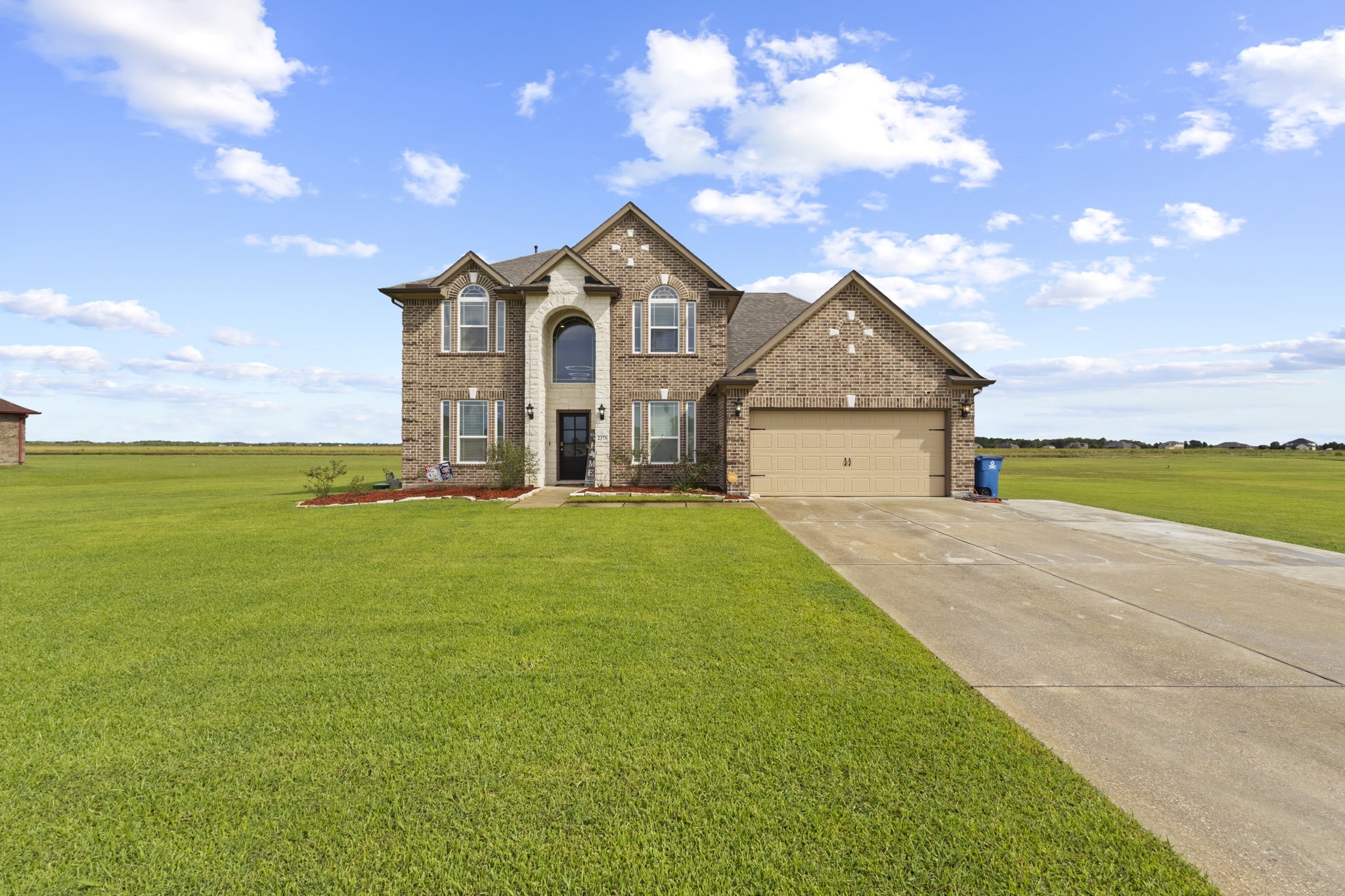 2375 Diamond D Lane Beaumont, TX 77713 - Photo 3 of 43 a front view of a house with garden