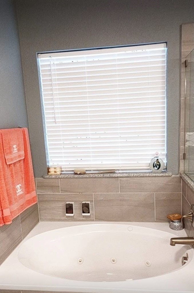 2375 Diamond D Lane Beaumont, TX 77713 - Photo 34 of 43 a view of a bath tub sitting in a bathroom