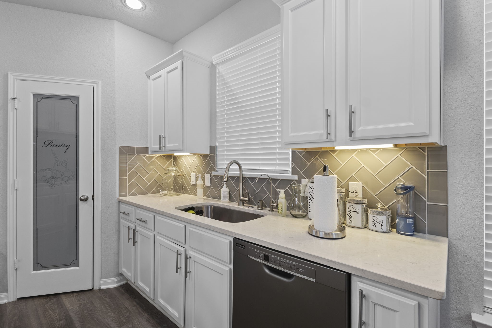 2375 Diamond D Lane Beaumont, TX 77713 - Photo 36 of 43 a kitchen with a sink and cabinets