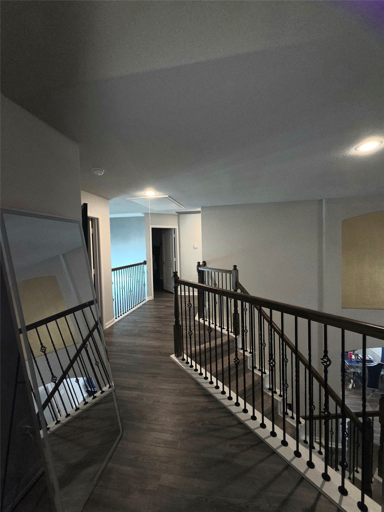 2375 Diamond D Lane Beaumont, TX 77713 - Photo 40 of 43 a view of staircase with lots of frames on wall and wooden floor