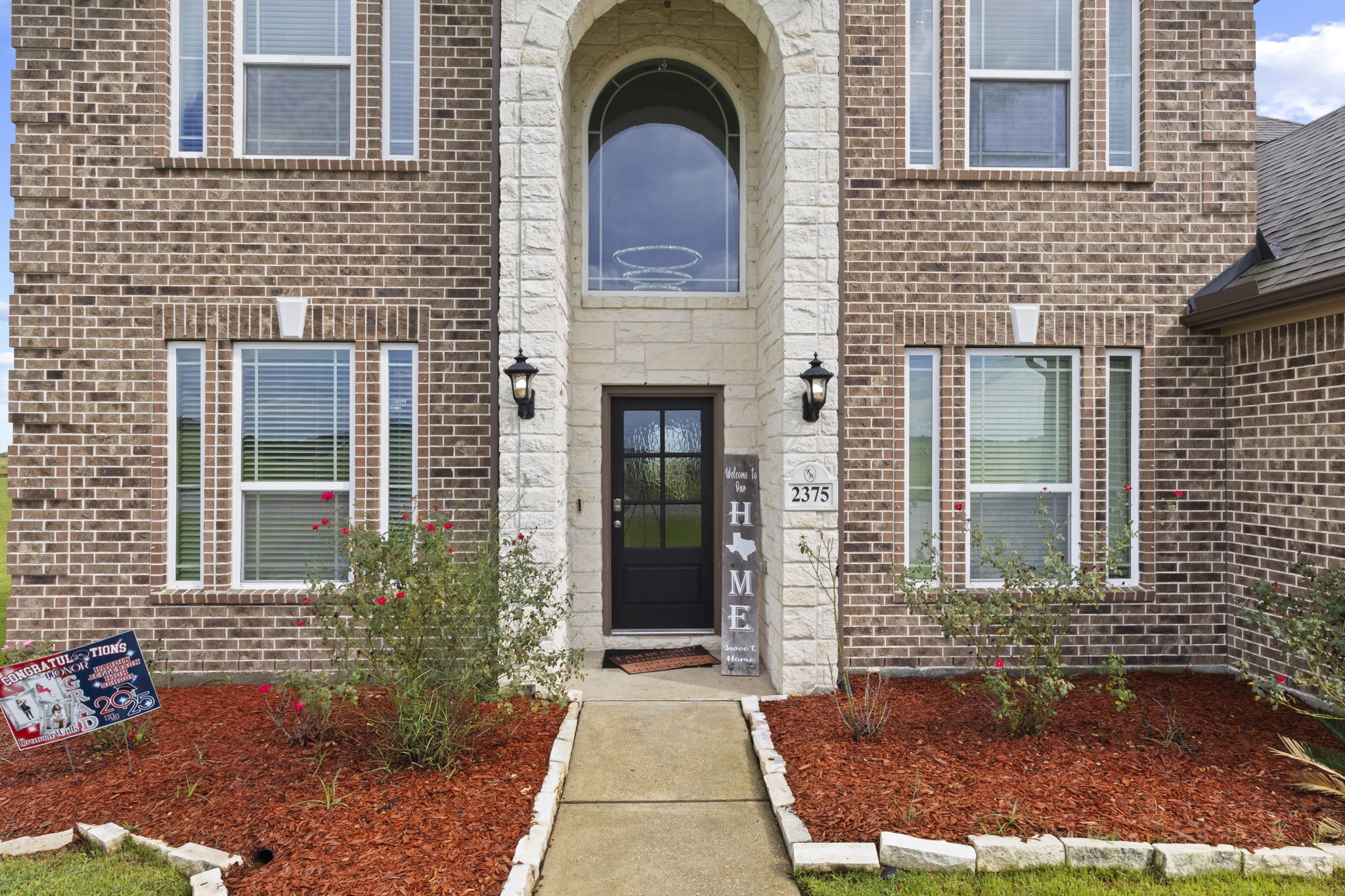 2375 Diamond D Lane Beaumont, TX 77713 - Photo 4 of 43 a front view of a house with garden