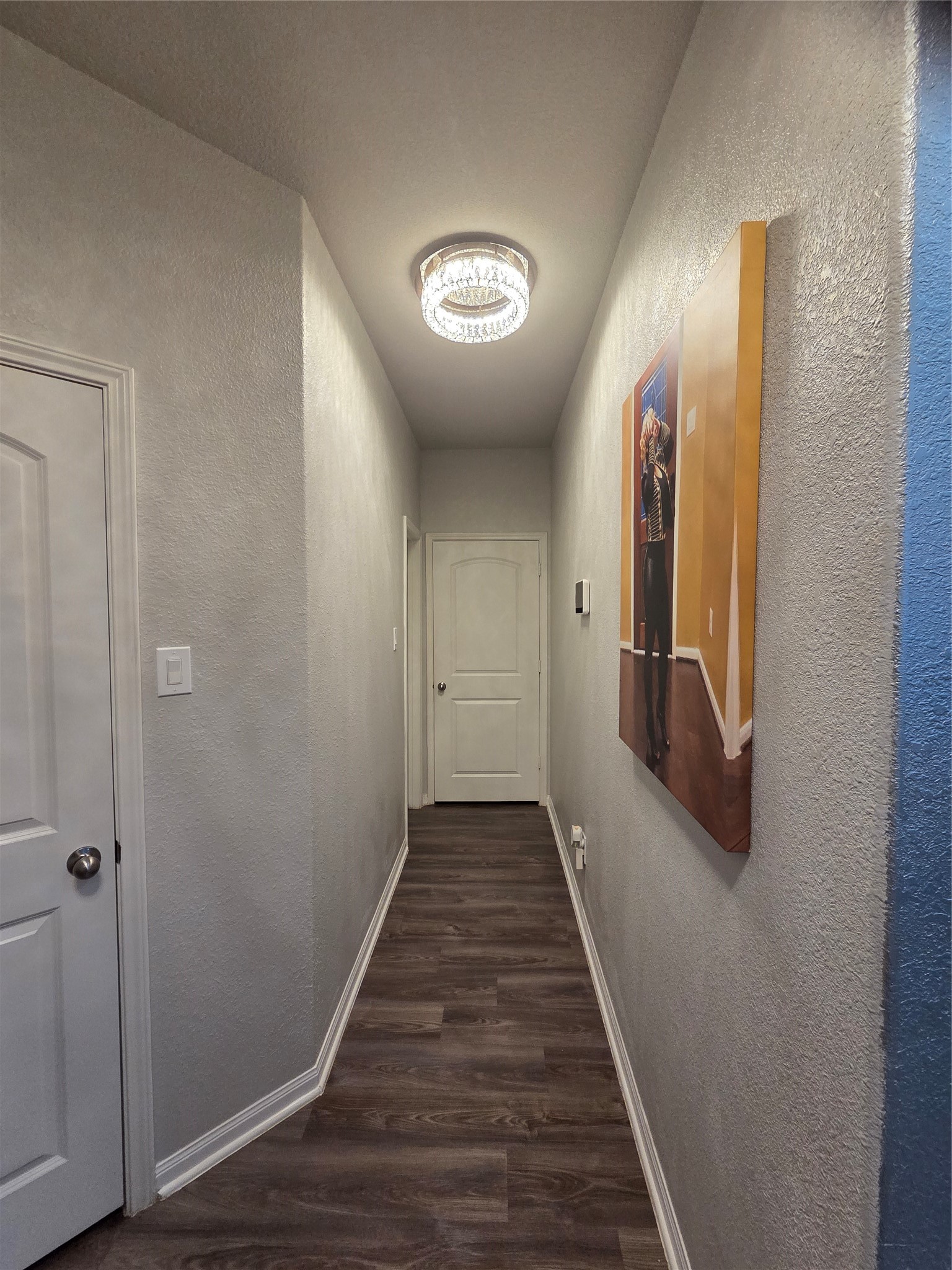2375 Diamond D Lane Beaumont, TX 77713 - Photo 10 of 43 a view of a hallway with wooden floor