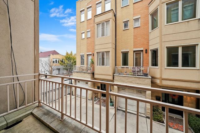 a view of a building from a balcony