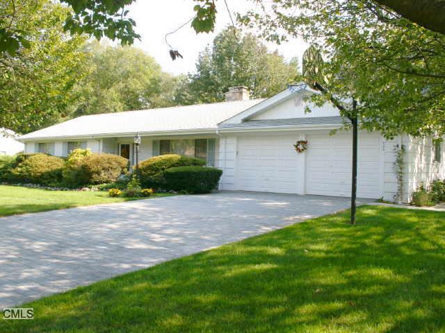 155 Oak Ridge Road Stratford, CT 06614 - Photo 1 of 1 a view of a house with a yard and plants