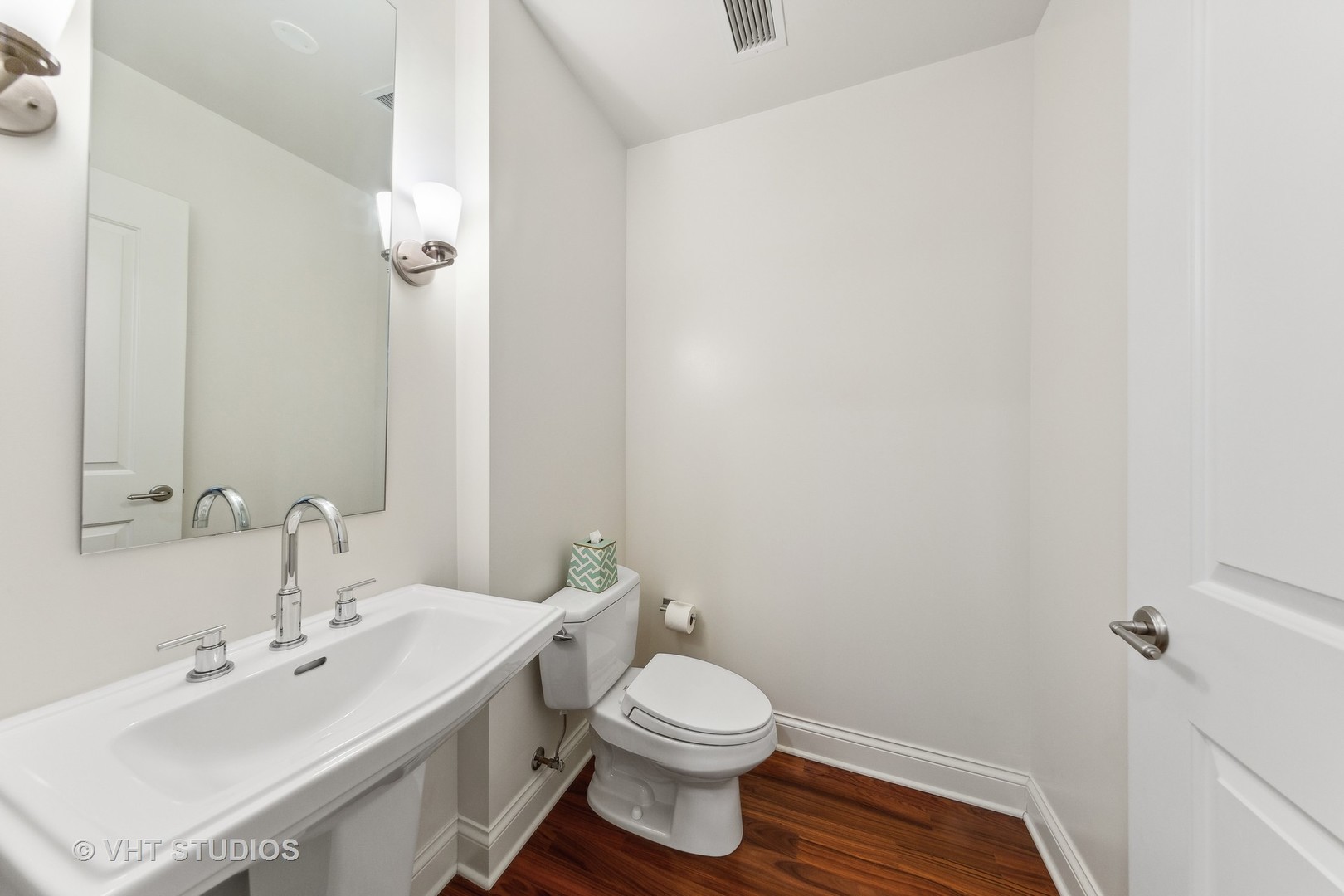 10 East Delaware Place, Unit 19C Chicago, IL 60611 - Photo 16 of 25 a bathroom with a sink a toilet and shower