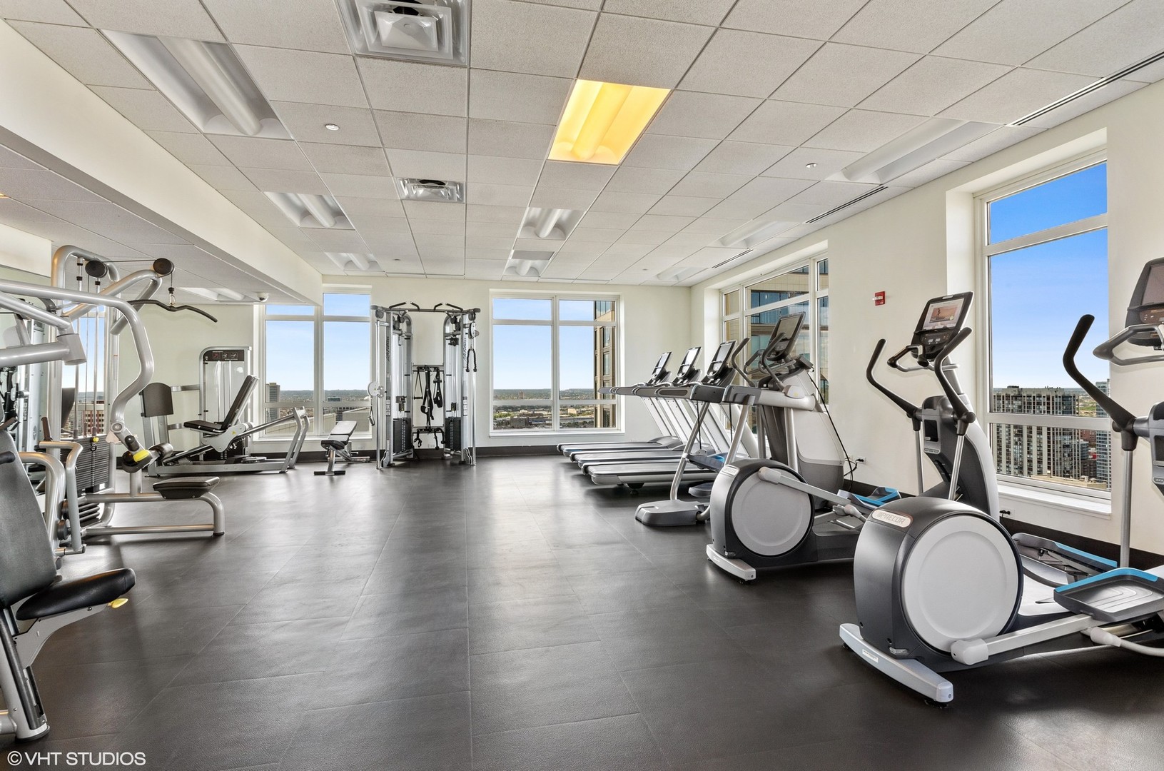 10 East Delaware Place, Unit 19C Chicago, IL 60611 - Photo 22 of 25 a view of a room with gym equipment