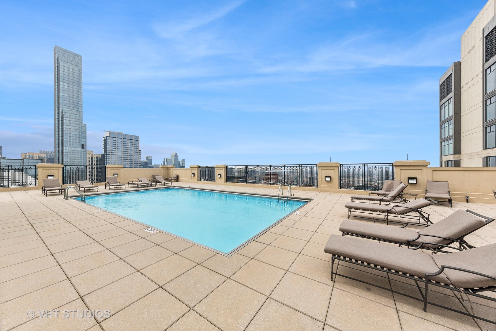 10 East Delaware Place, Unit 19C Chicago, IL 60611 - Photo 24 of 25 a view of a terrace with chairs