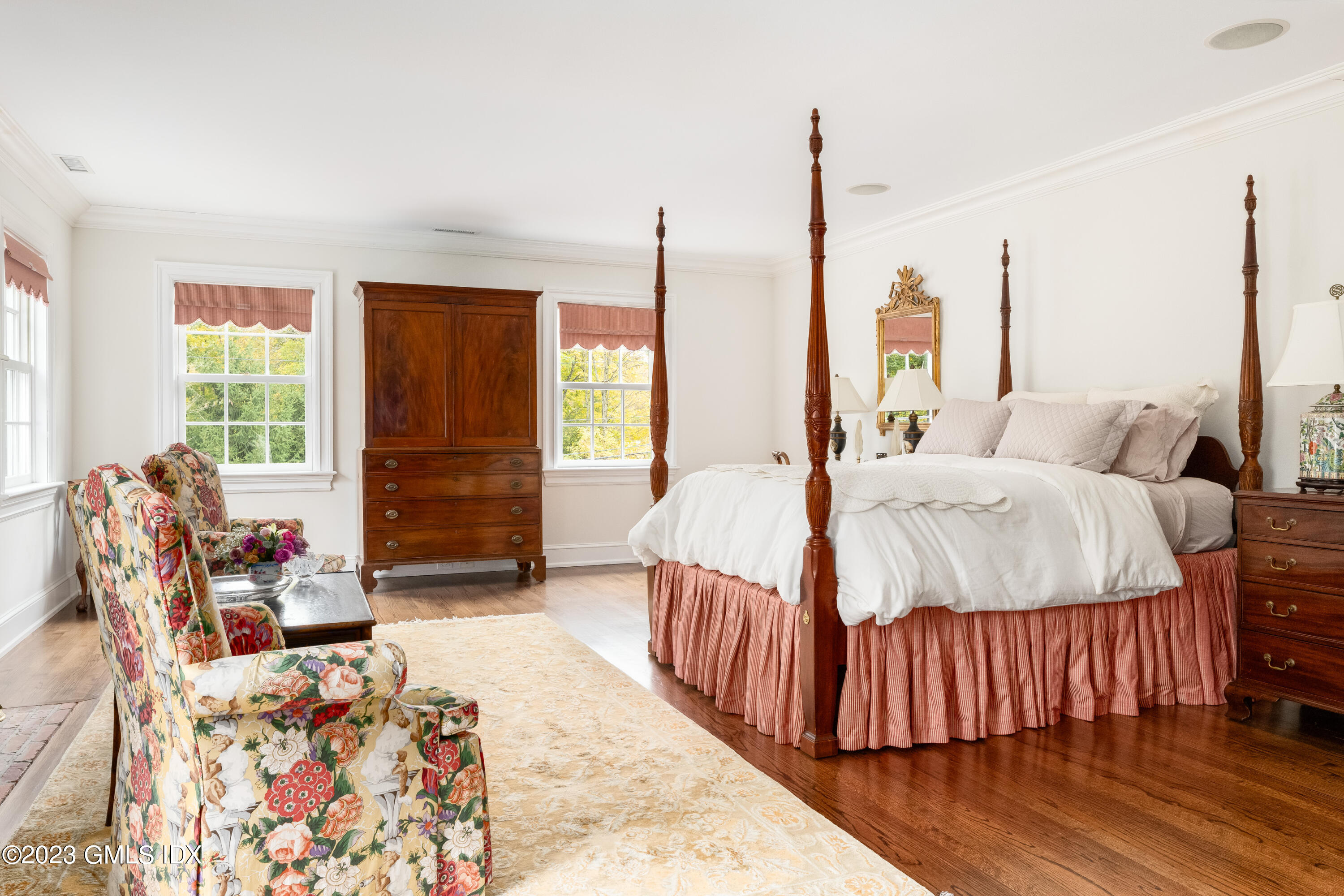 6 Hill Road Greenwich, CT 06830 - Photo 15 of 35 a bed room with a bed and a couch